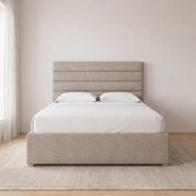 Switzer Premium Upholstered Bed with horizontal channel headboard shown in stone fabric in a bright bedroom – illustrative image – Dune & Pine
